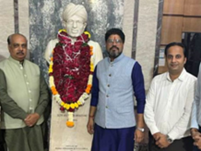 Floral tributes to the statue of Sheth Walchand Hirachand